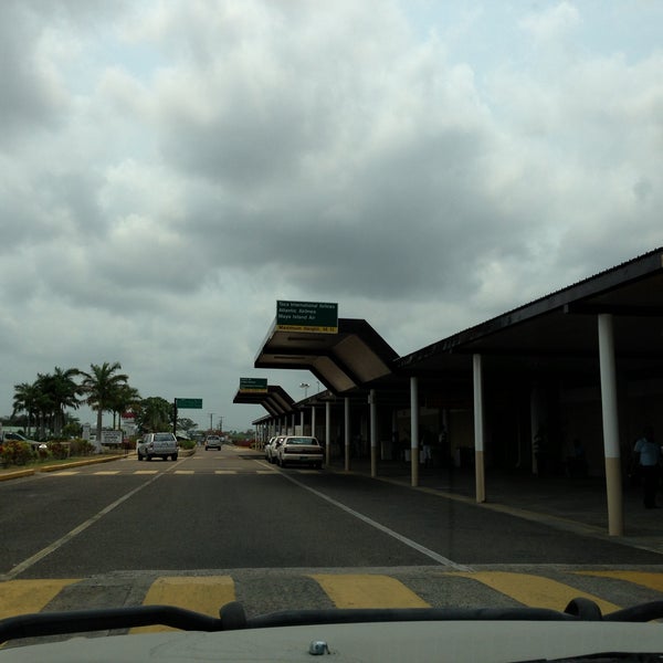 Photo taken at Philip S.W. Goldson International Airport (BZE) by Ramon R. on 4/16/2013