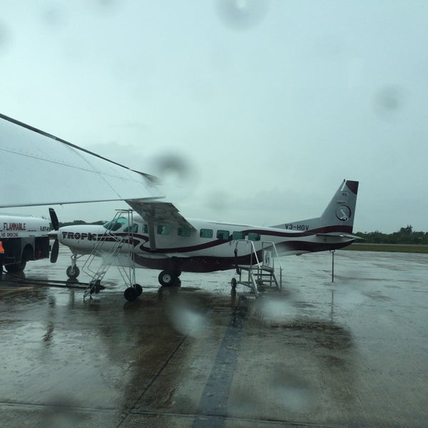 Photo taken at Philip S.W. Goldson International Airport (BZE) by Ramon R. on 9/25/2014