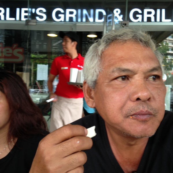 Photo taken at Charlie&#39;s Grind &amp; Grill by Doj R. on 6/16/2013