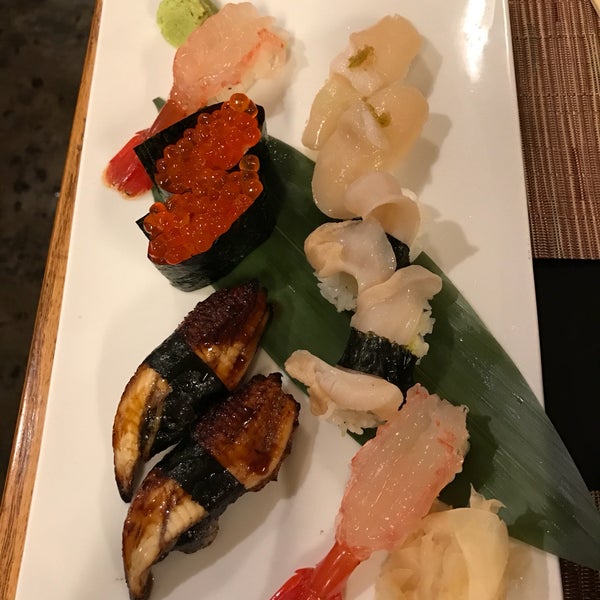 Photo taken at Sushi Go 55 by Pom P. on 12/4/2016