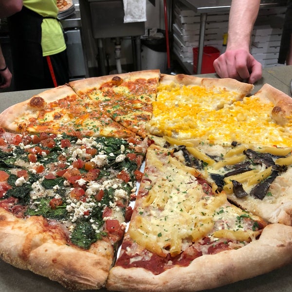 Photo taken at Ian&#39;s Pizza by Anna J. on 5/5/2018