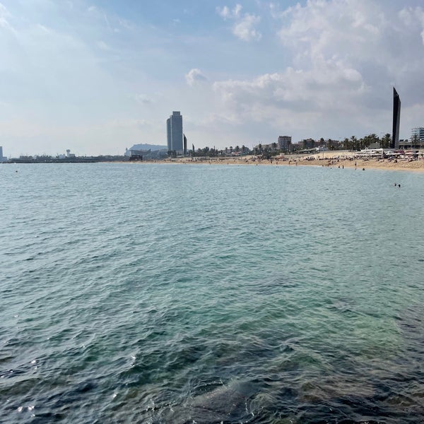 Photo taken at Mar Bella Beach by Abdulaziz on 10/17/2021