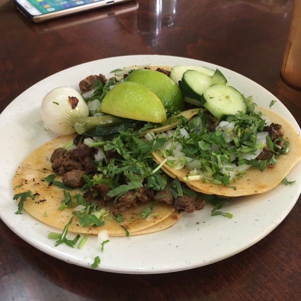 Photo taken at Tacos El Bronco by Sophia S. on 9/14/2018