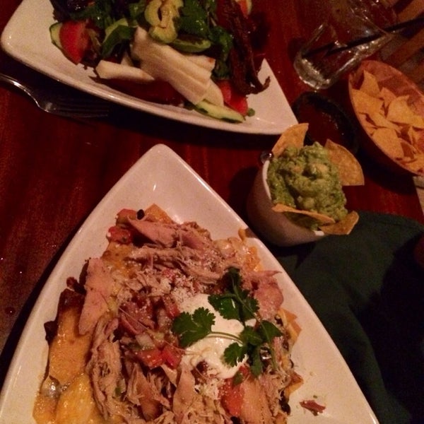 Photo taken at Olitas Cantina &amp; Grille by Emily B. on 9/21/2014