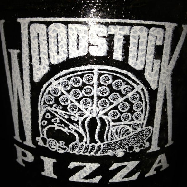 Photo taken at Woodstock&#39;s Pizza by Andy on 12/28/2012