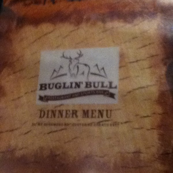 Photo taken at Buglin&#39; Bull Restaurant and Sports Bar by Paeton H. on 3/16/2013