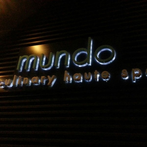 Photo taken at Mundo by Nina K. on 2/19/2014