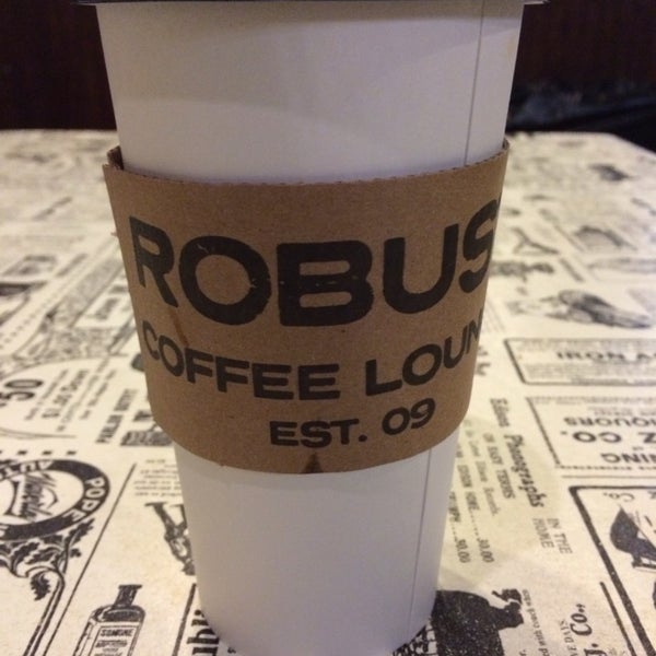 Photo taken at Robust Coffee Lounge by Jessica R. on 12/5/2013