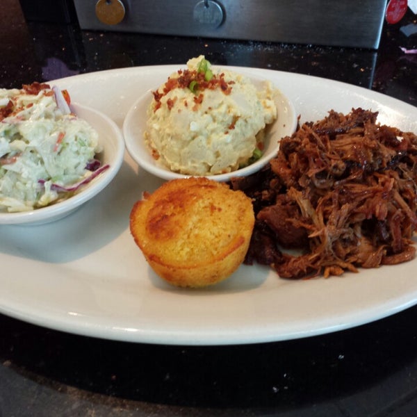 Pulled pork, red white and bleu coleslaw and rocky top potato salad with corn bread. Delicious! Great food and friendly staff. Got here at 12:30 on a Thursday, this place is packed.