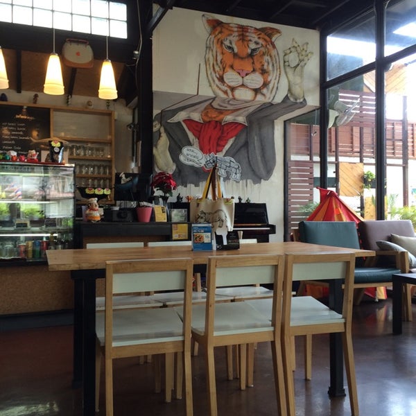 Photo taken at DOZE café by Santi C. on 9/21/2014