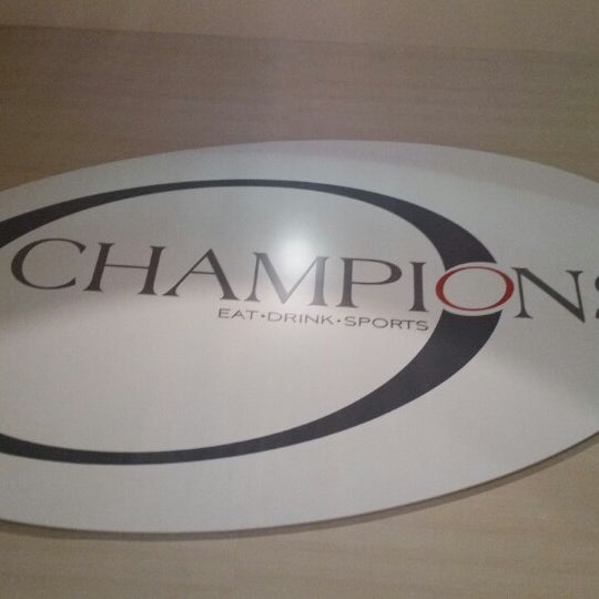 Photo taken at Champions Sports Bar by Derek A. on 5/10/2014