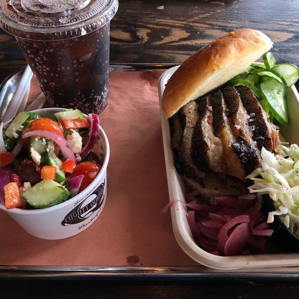 Photo taken at Mighty Quinn&#39;s BBQ by Marcio N. on 9/2/2019