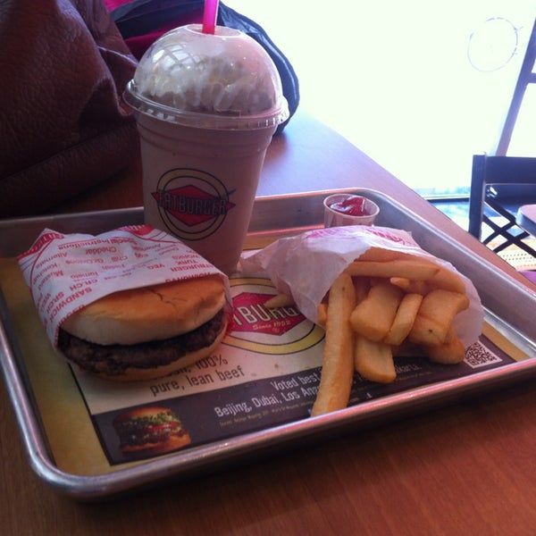 Photo taken at Fatburger by Molly R. on 6/22/2013