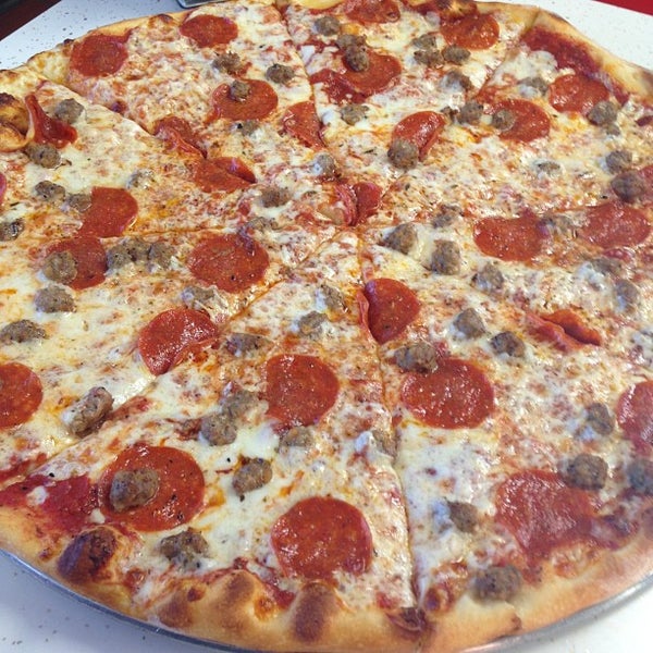 Photo taken at Tony&#39;s Pizza by DangerousBri *. on 8/26/2013