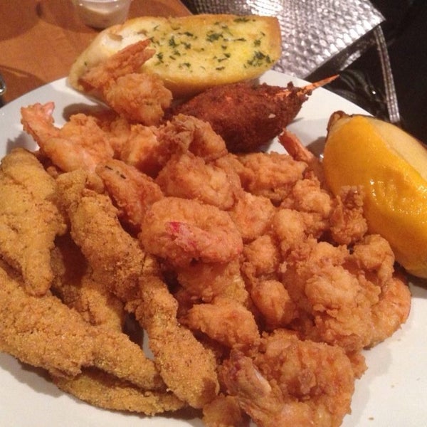 Photo taken at Snockey&#39;s Oyster &amp; Crab House by Donald M. on 11/24/2013