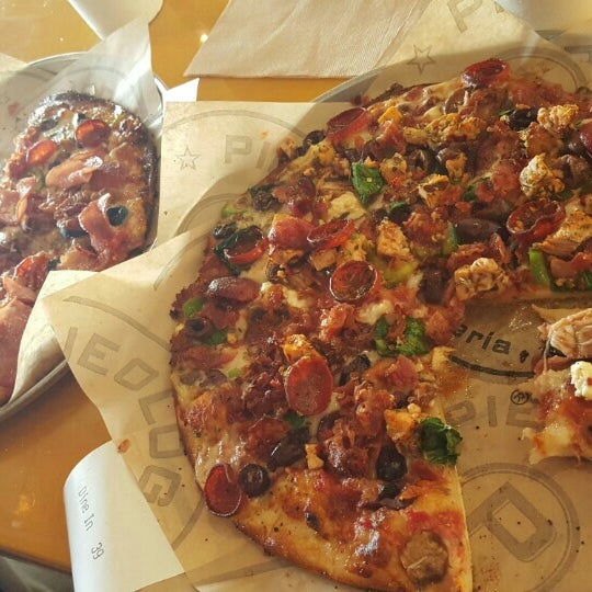Photo taken at Pieology Pizzeria by Jamie R. on 3/15/2016