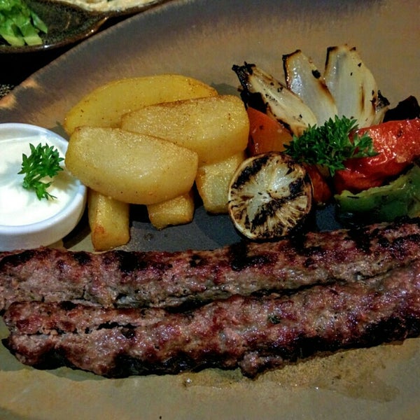 Foto diambil di Al Nafoura Lebanese Restaurant oleh Sergei S. pada 4/21/2016