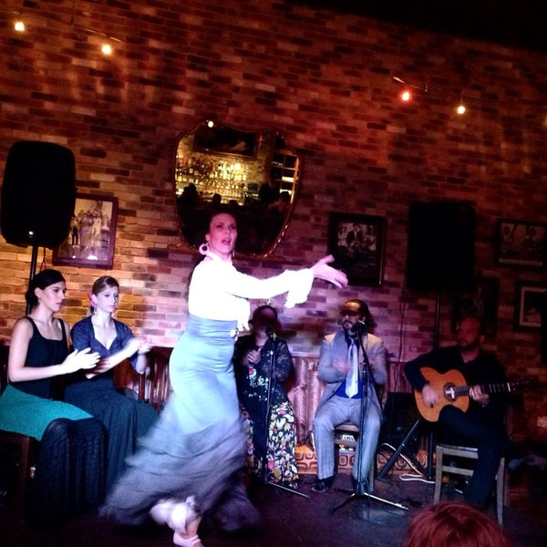 Photo taken at Malaga Tapas &amp; Bar by Kirby S. on 7/24/2014