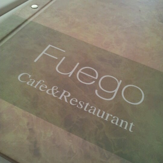 Photo taken at Fuego Cafe &amp; Restaurant by Nils N. on 2/20/2013