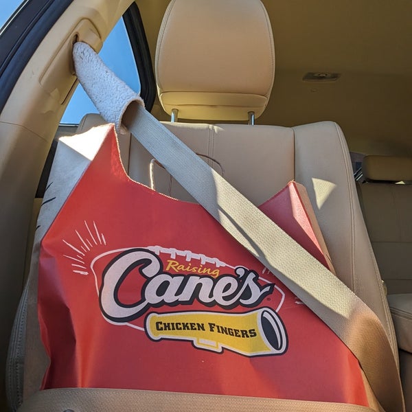 Photo taken at Raising Cane&#39;s Chicken Fingers by Cosmo S. on 12/21/2023