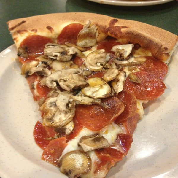 Photo taken at Woodstock&#39;s Pizza by Katy D. on 3/21/2013