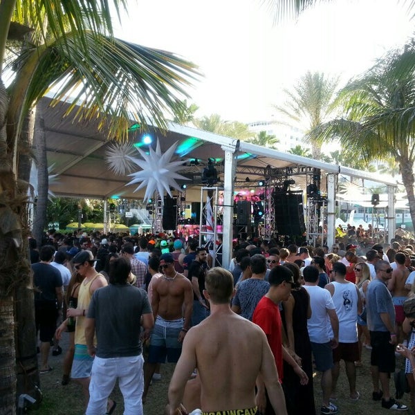 Photo taken at The Pool Parties at The Surfcomber by Kevin D. on 3/21/2013