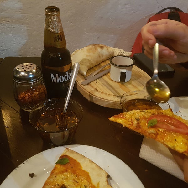 Photo taken at Trescielos Pizzas y Helados by Omar R. on 3/23/2019