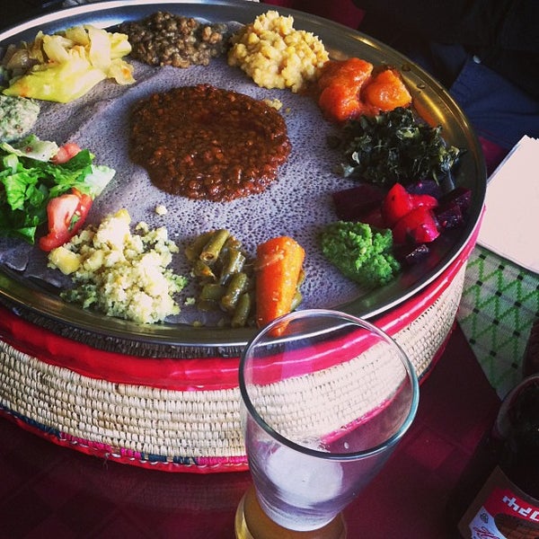 Photo taken at Bete Ethiopian Cuisine &amp; Cafe by Katie S. on 12/5/2013
