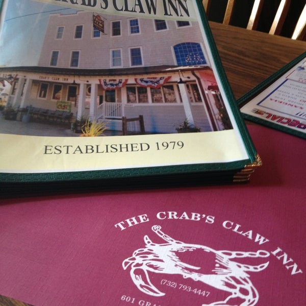 Photo taken at Crab&#39;s Claw Inn by Cynthia V. on 7/4/2013