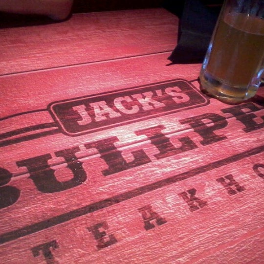 Photo taken at Jack&#39;s Bullpen Steakhouse by Fernanda N. on 9/7/2012