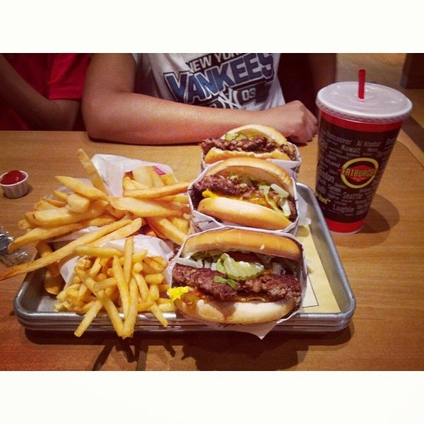 Photo taken at Fatburger by Jesse L. on 7/22/2014