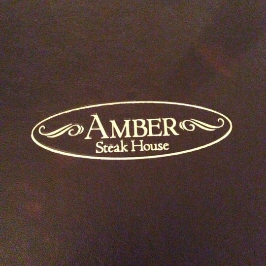 Photo taken at Amber Steakhouse by Michael N. on 9/29/2012