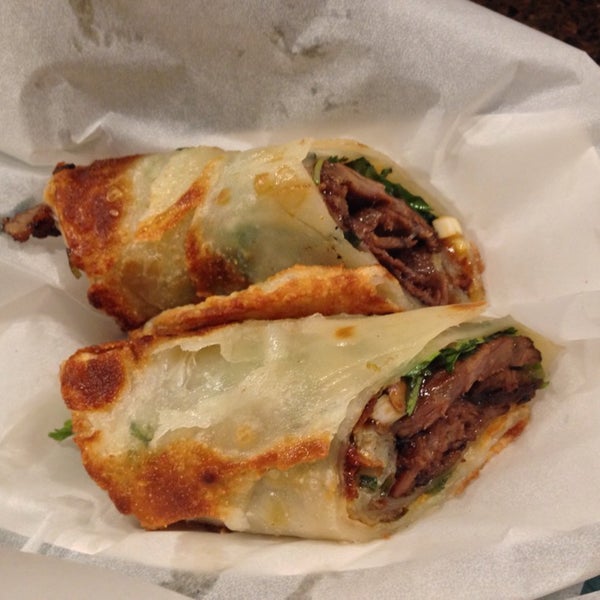 Creative takes on the Chinese bao, such as the O.G. (pork belly) and Baogolgi, are the focus of the menu, but don't look over the excellent Braised Beef Scallion Pancake Wrap.