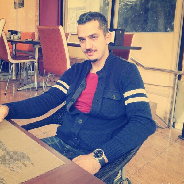 Photo taken at Moston Cafe by Tuluğhan E. on 12/10/2015