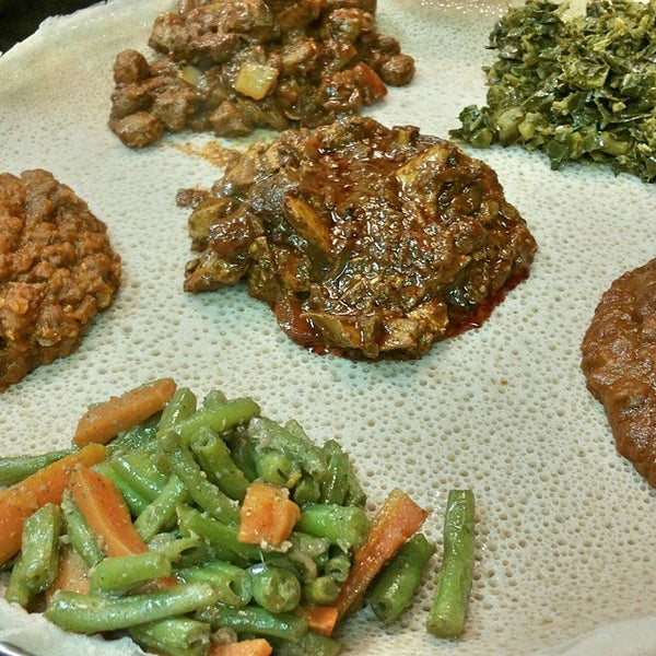 Photo taken at Lalibela Ethiopian Restaurant by Austine N. on 5/24/2015