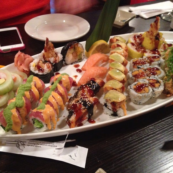 Foto tomada en Sushi Bar  por Christy M. el 1/22/2014