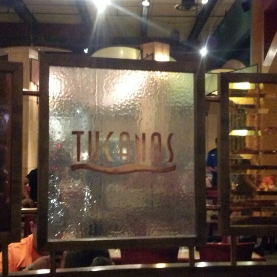 Photo taken at Tucanos Brazilian Grill by Nadia M. on 5/4/2013