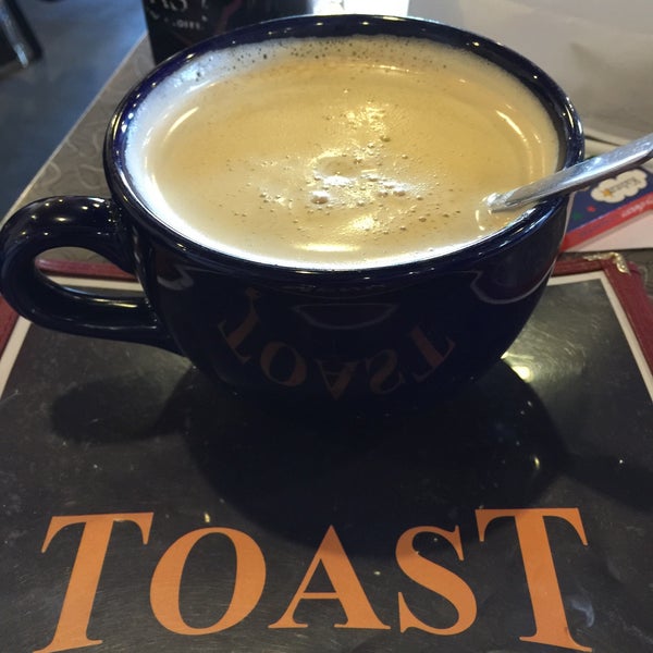 Photo taken at Toast Fine Food &amp; Coffee by Brett H. on 4/18/2015
