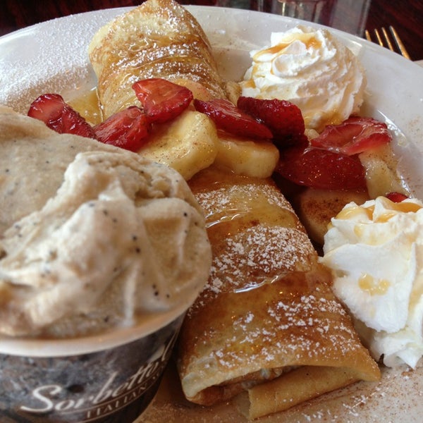 Photo taken at Midtown Crêperie &amp; Café by Laura M. on 6/30/2013