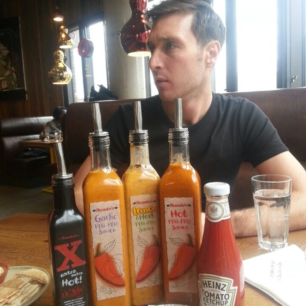 Photo taken at Nando&#39;s by Lee G. on 4/18/2013