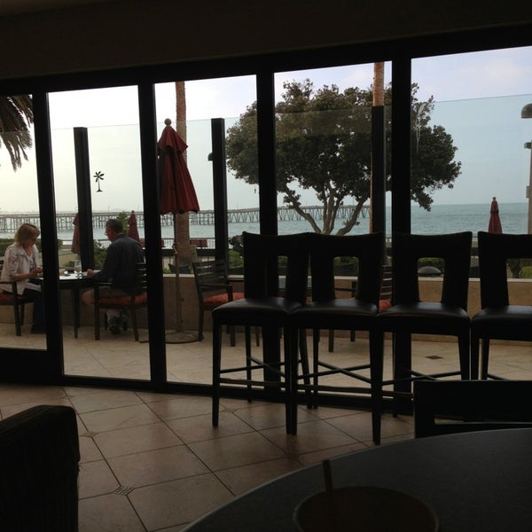 Photo taken at Aqua Beachfront Bar by Ana H. on 5/23/2013