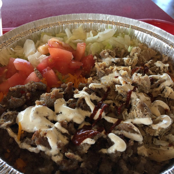 Photo taken at The Halal Guys by Mike V. on 1/25/2017