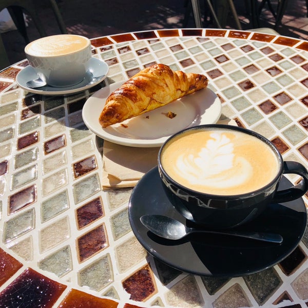 Almond croissant + Latte = ❤️  Backyard and free WiFi. Nice place and friendly staff. Thank you guys