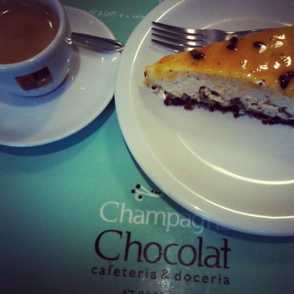 Photo taken at Champagne Chocolat Cafeteria &amp; Doceria by Luana V. on 8/31/2013