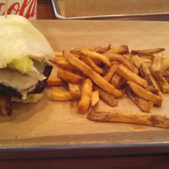 Photo taken at MOOYAH Burgers, Fries &amp; Shakes by Angela D. on 6/1/2014