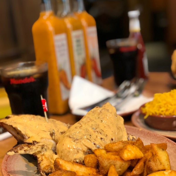 Photo taken at Nando&#39;s by KH | on 3/29/2019