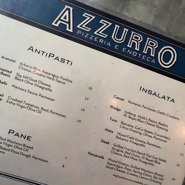 Photo taken at Azzurro Pizzeria e Enoteca by Tashia R. on 4/10/2022