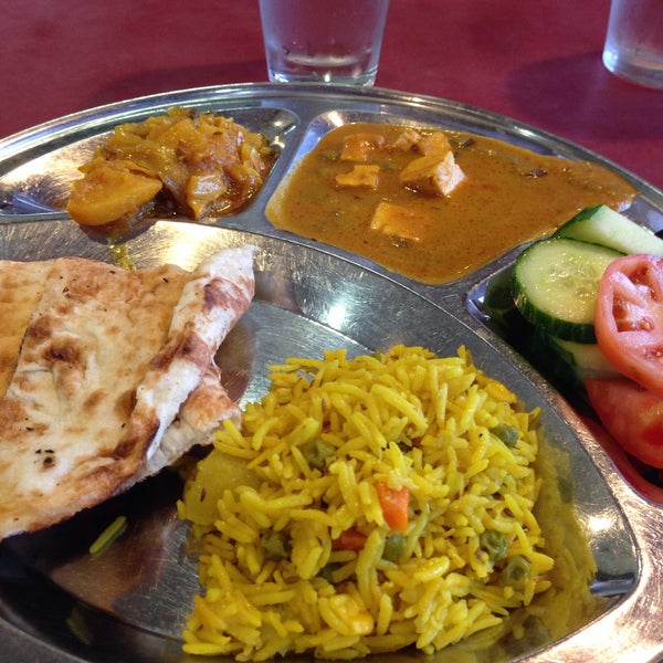 Photo taken at All India Sweets &amp; Restaurant by Priscila O. on 12/7/2014