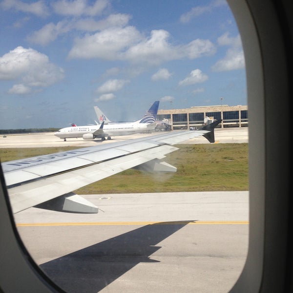 Photo taken at Cancun International Airport (CUN) by Memo T. on 5/11/2013