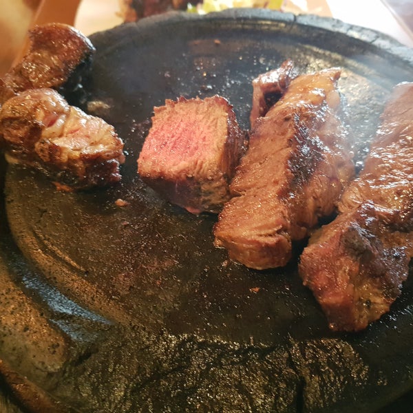 Photo taken at Asador La Vaca Argentina by Luis H. on 10/26/2018